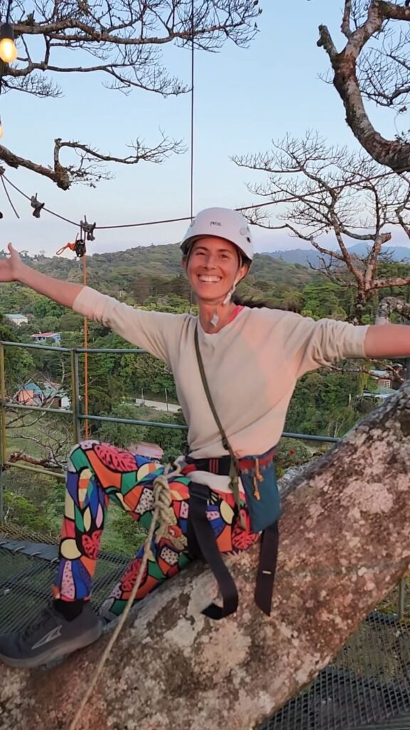 Thanking the world from the top of a tree.